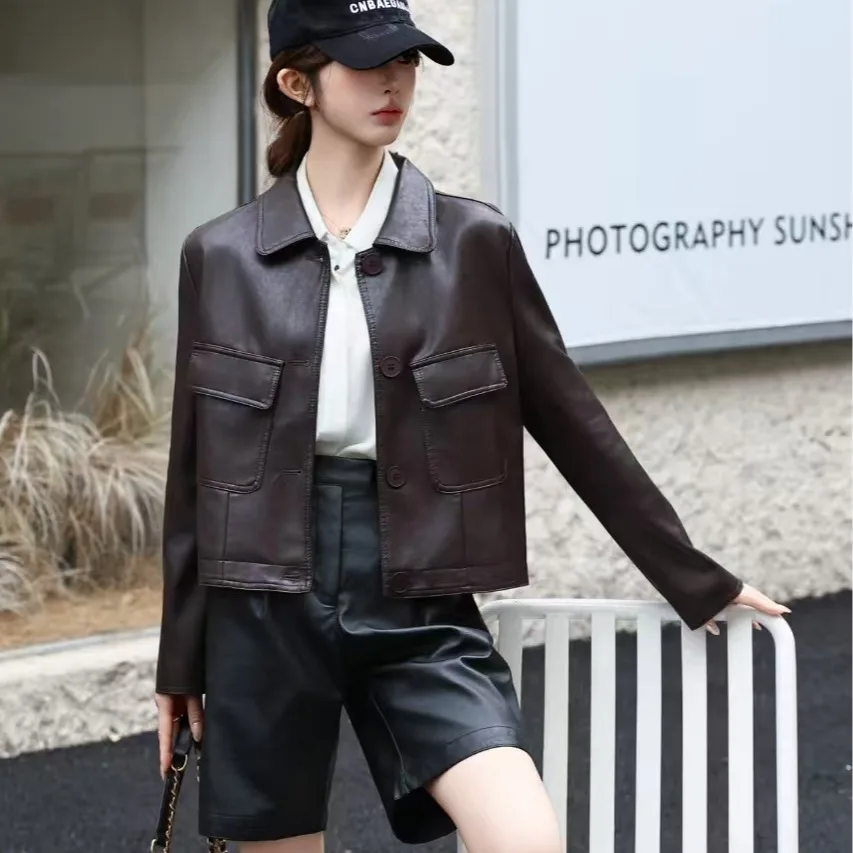 ハイエンドのオートバイレザージャケット、女性用ファッショナブルで多用途なスタンドカラーパッド入りコート、ストリートスタイルのカジュアルアウターウェア