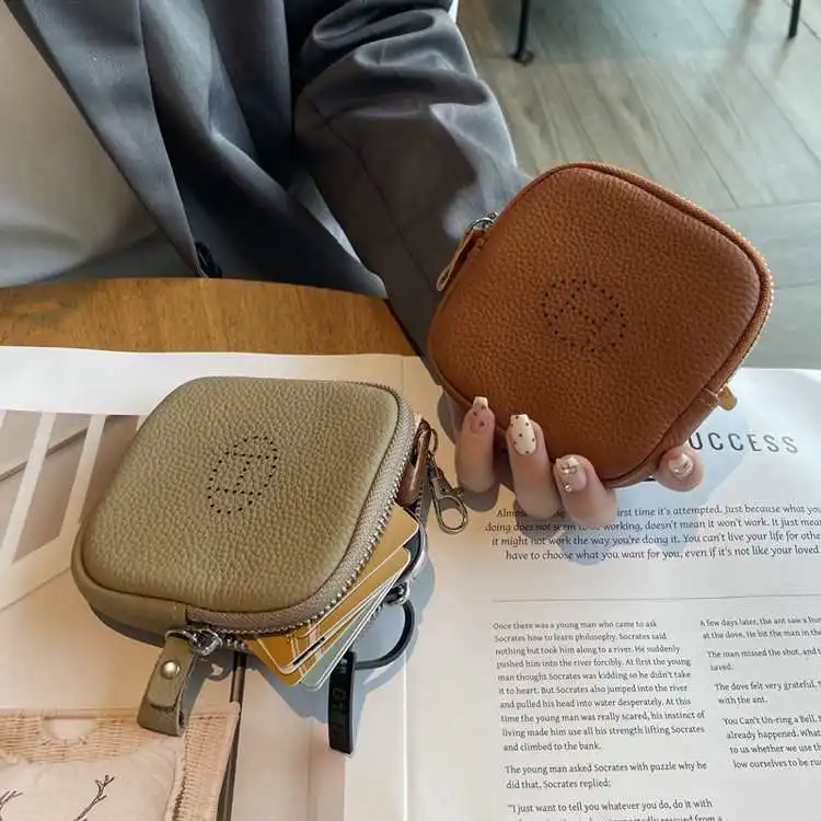 

Модный женский кошелек из натуральной кожи, большой емкости, высокое эстетическое значение, защитный чехол для наушников, верхний слой из воловьей кожи