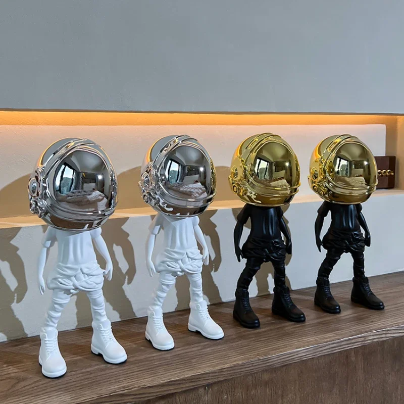 

Modern Creative Earphone Astronaut Figurine Desk Model Ornaments Living Room Cartoon Sculpture Resin Crafts Home Decor Gift Toys