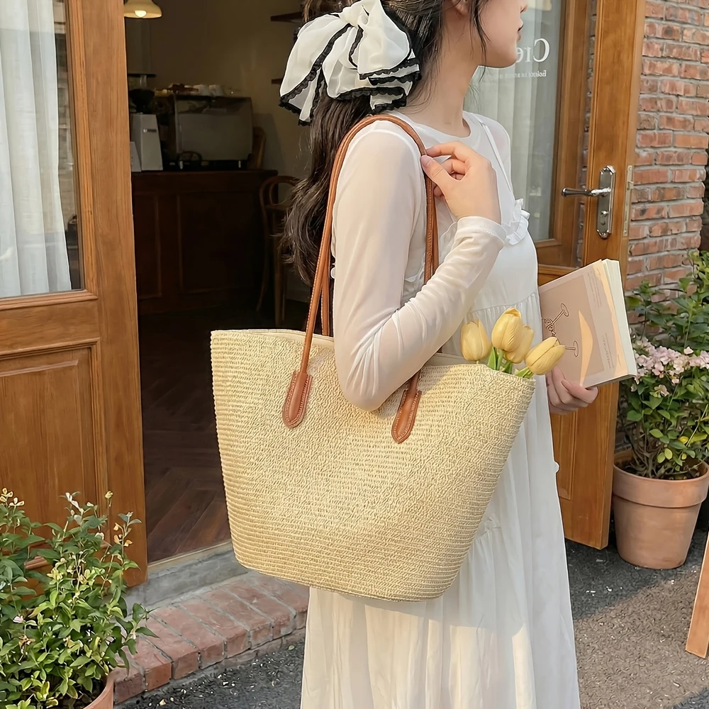 

Ladies' tote bag French shoulder bag Grass woven bag Travel and vacation large capacity tote bag Simple beach commuting bag