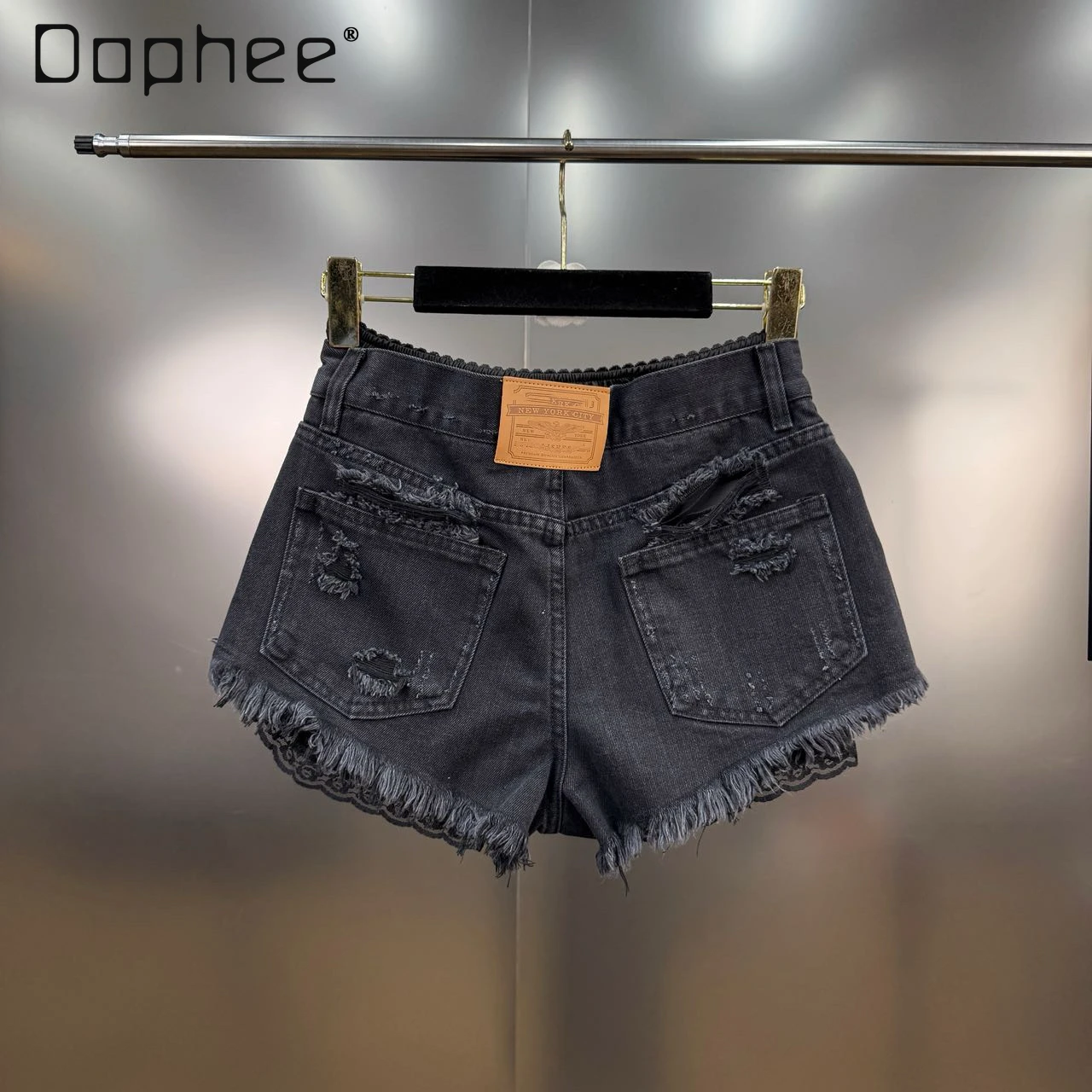 Estate 2025 Nuovo francese retrò pizzo splicing strappato bordo grezzo falso pantaloncini di jeans in due pezzi Spice Girl Y2K jeans slim a vita alta