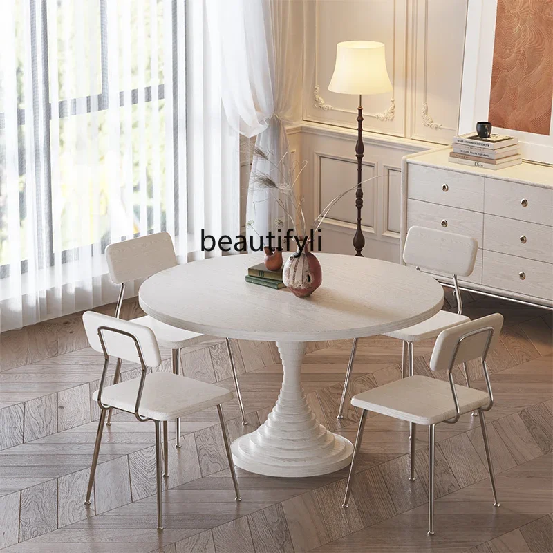 

Light luxury creamy solid wood dining table and chairs for home use French retro round table living room dining table furniture