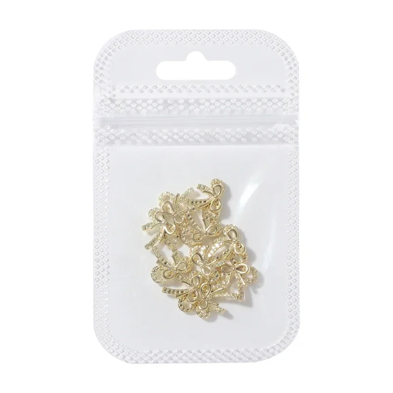 10 pz/borsa argento oro accessori per unghie Kit di decorazione in metallo Charms strumenti di Design per unghie forniture Kawaii Nail Butterfly Alloy Bow