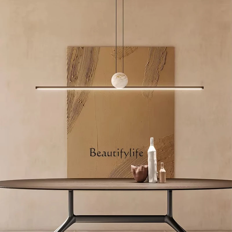 

*Italian minimalist one-word restaurant marble bar counter all-copper strips hanging luminous objects