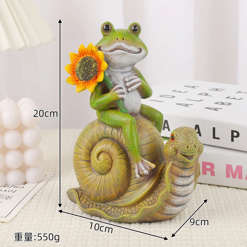 

Frog riding snail cartoon animal statue, outdoor garden resin crafts, garden courtyard landscape sculpture. Art Decoration