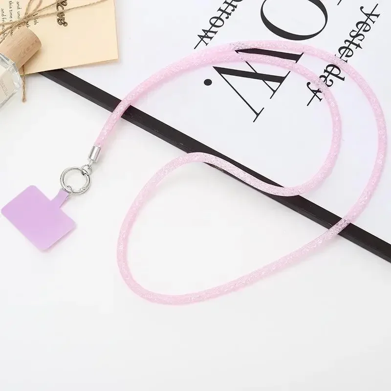 حبل هاتف ماسي فاخر - حبل معلق مضاد للضياع من حجر الراين الكريستالي، سلسلة حزام كروس طويلة لهاتف iPhone وXiaomi