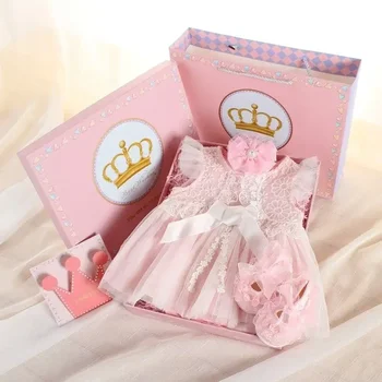 Adorable newborn pink romper paired with princess skirt and headband set - perfect baby girl shower gift box
