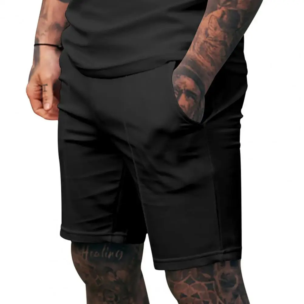 Celana Pendek Pria Regular Fit Celana Pendek Kaki Lebar Pinggang Elastis Menengah Pria dengan Saku Celana Panjang Kasual Warna Solid untuk Pakaian Sehari-hari