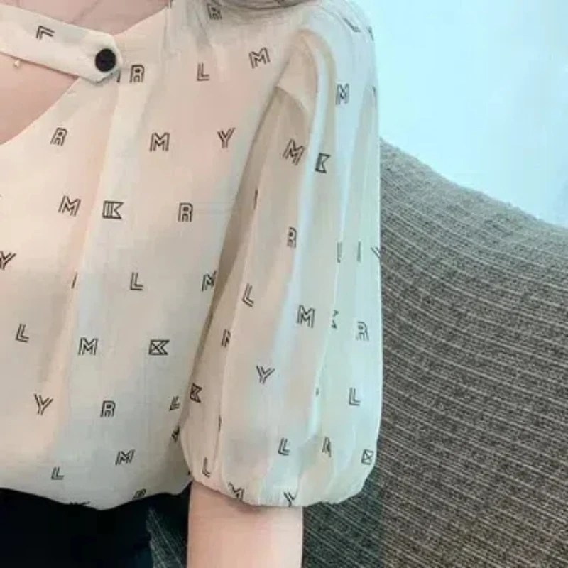 Jersey holgado con cuello en V para mujer, camisa de Chifón con manga abullonada y botones, moda de verano, 2024