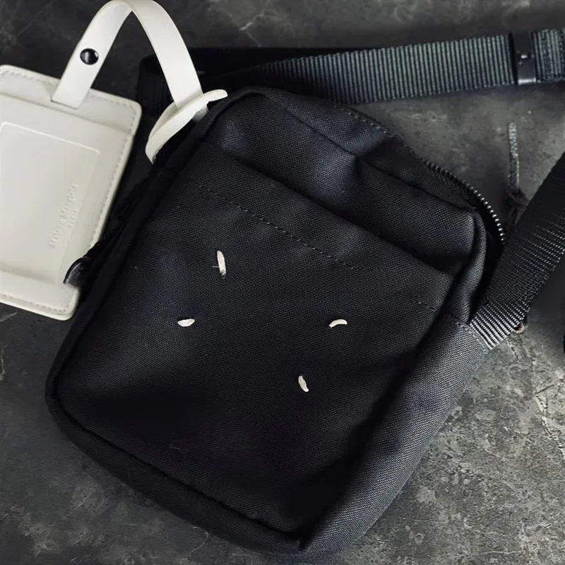 ea-independent-classic-four-needle-canvas-single-shoulder-bag-unisex-outdoor-sports-leisure-crossbody-phone-bag
