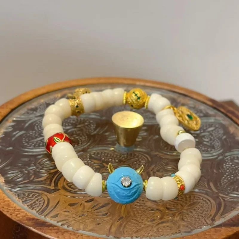 

Bone Large Intestine Single Circle Bracelet with Turquoise Little Gold-Plated Premium Beaded Jewelry