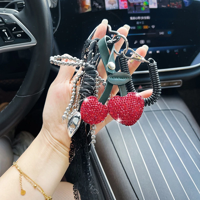 Creative Alloy Diamond Inlaid Fruit Cherry Car keychain Fashion With Diamond Woven Rope Personalized Bag Decoration Pendant Gift