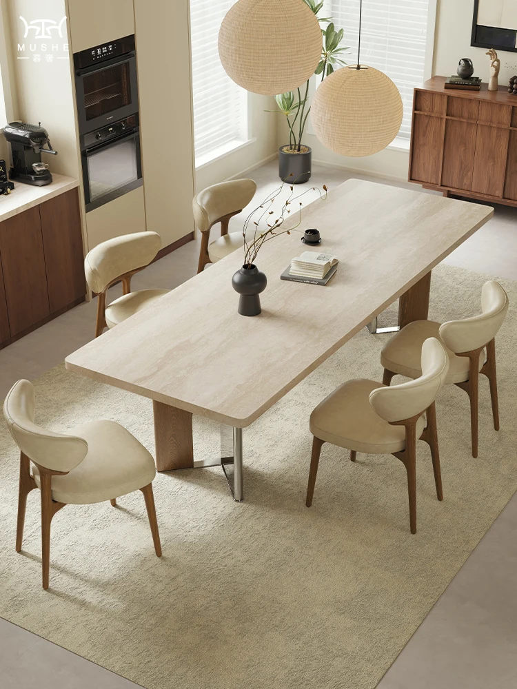 

Twilight luxury Bauhaus retro travertine rock slab dining table and chairs solid wood home villa medium ancient style hanging re