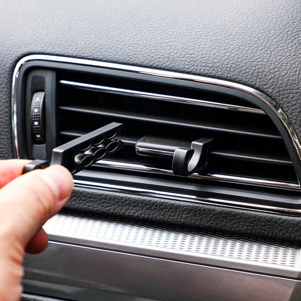 Suporte multifuncional para saída de ar do carro, gancho para celular, organizador de fones de ouvido, óculos de sol e porta-chaves.