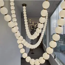 French living room lamp modern and minimalist dining room long pearl necklace lamp Buddha bead duplex staircase pendant lamp
