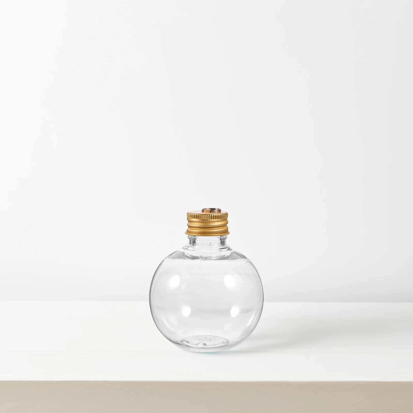 

6Pcs Transparent Ball Bottles 150Ml Clear Fillable Ornaments with Gold Caps Holiday Drink Holders for Christmas Wedding Party