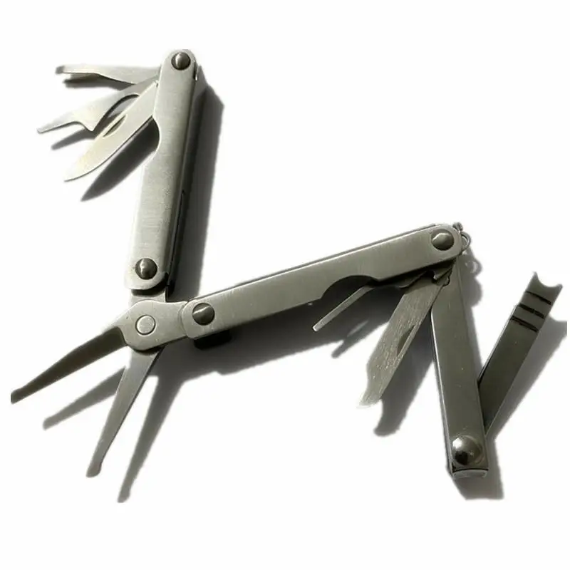Multifunctional folding combination tool nail scissors portable bottle opener