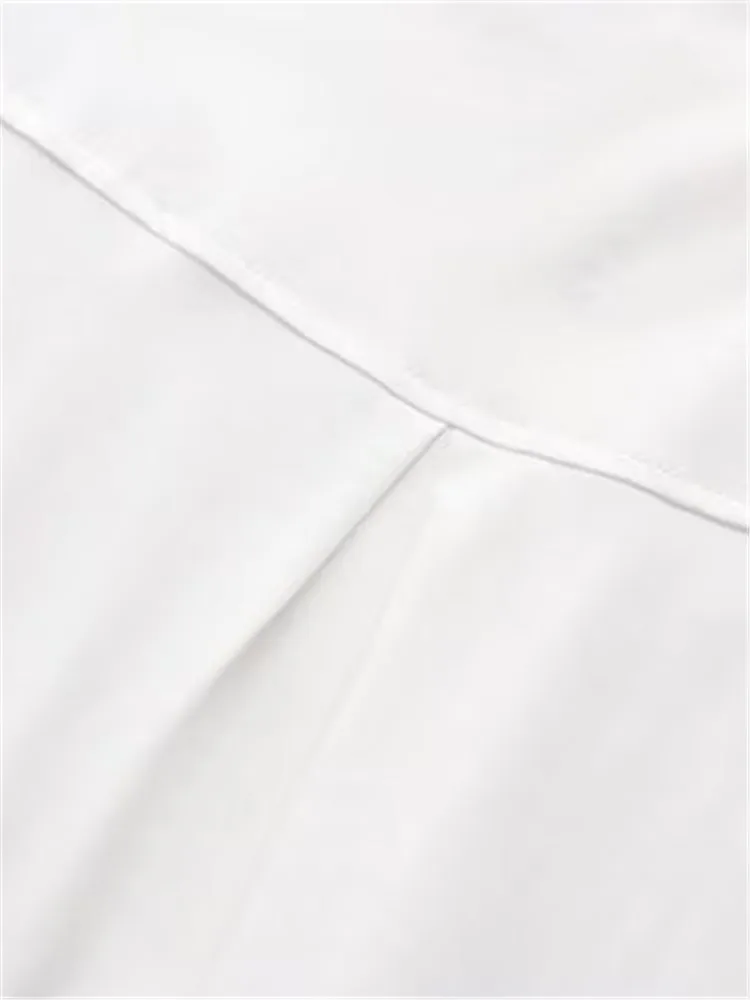 Tissu polyester monochrome pour femme, vêtements grande taille, col rond, non commandé, raccord At, ourlet astronomique élastique cousu en Y