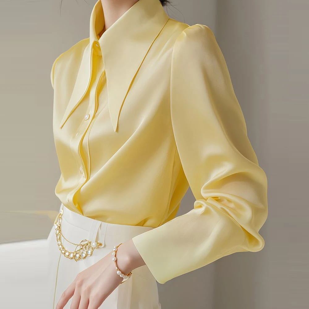

French yellow big pointed collar long sleeved shirt with a female design , unique, high-end, spring and autumn