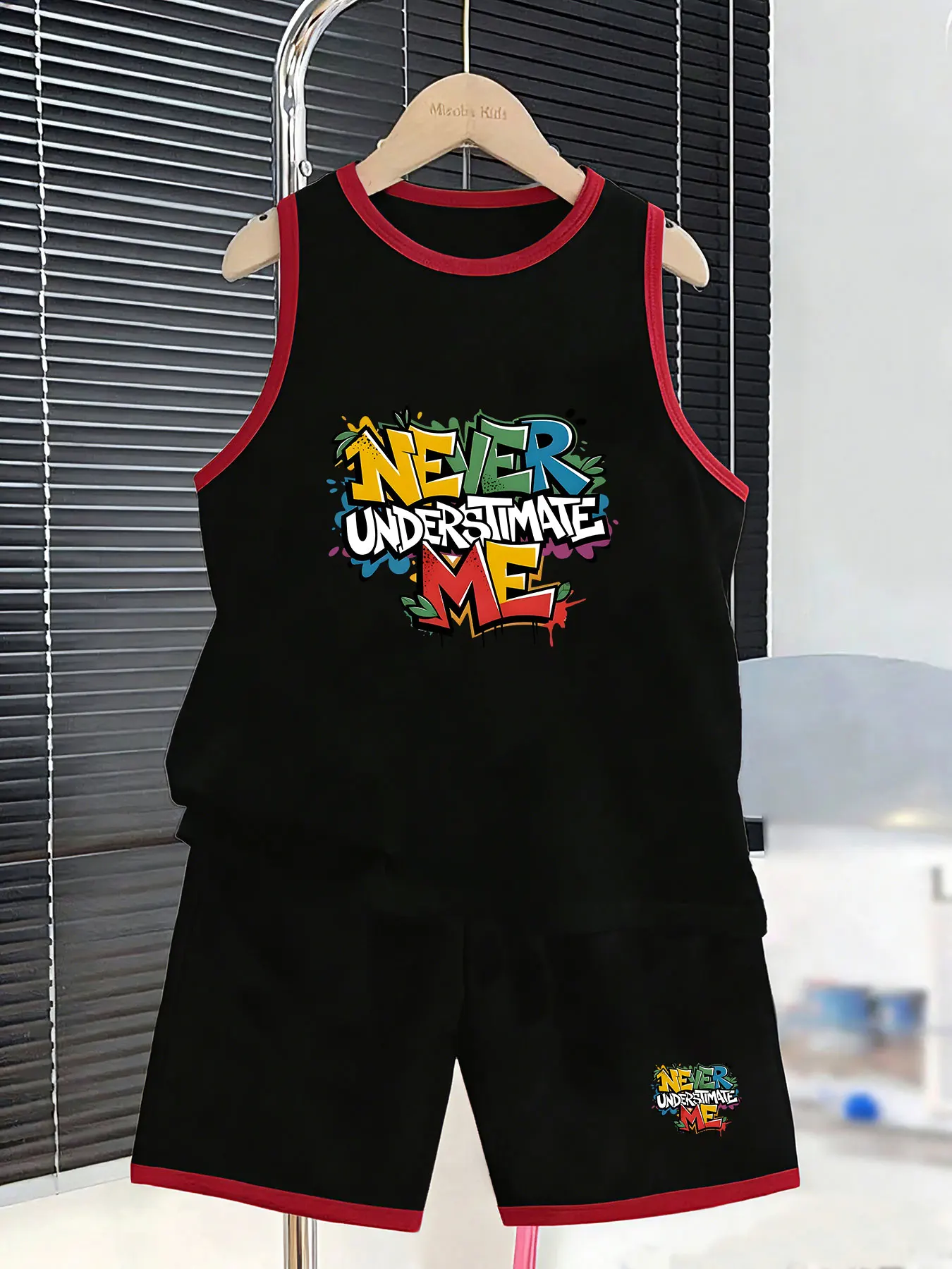 Boys' Graffiti Slogan Style Tank Top and Shorts Set, creating a trendy summer look. Made of skin-friendly and breathable fabric,