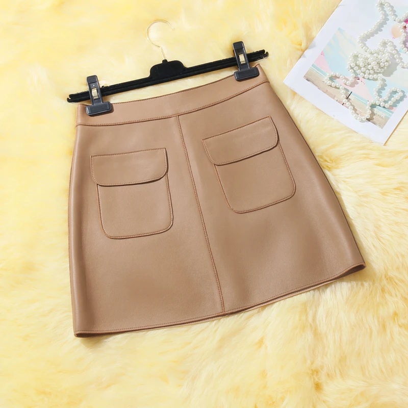 

Кожаная юбка из овчины с высокой талией, А-силуэт, женская короткая юбка, осенне-зимняя новинка, простая однотонная юбка