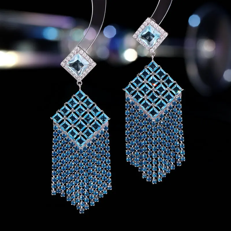 

Midnight Prism - Copper Zircon Cat's Eye Earrings with Angular Design & Layered Tassel