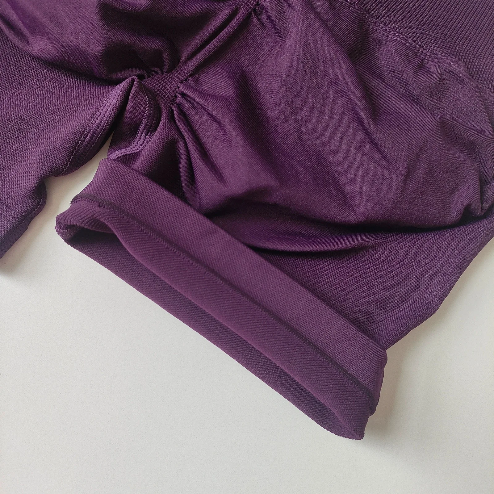 Damen-Sportshorts mit hoher Taille und Hüftlift-Effekt, pfirsichfarbene Po-Formung, eng anliegende, schnelltrocknende Lauf- und Trainingsshorts. – Detail 11