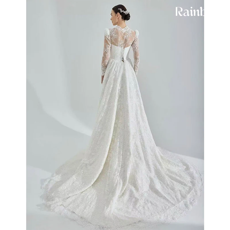 فستان زفاف برقبة عالية أورجانزا رشيقة مع تطريز على شكل حرف a ثوب حفلة كم كامل مخصص للعروس بأربطة فيستدو دي نوفيا