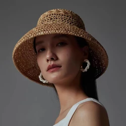 2025 New French Retro Style Breathable Hollow Raffia Sun Hat Ladies Summer Travel Fashion Concave Top Straw Hat Hat Wholesale