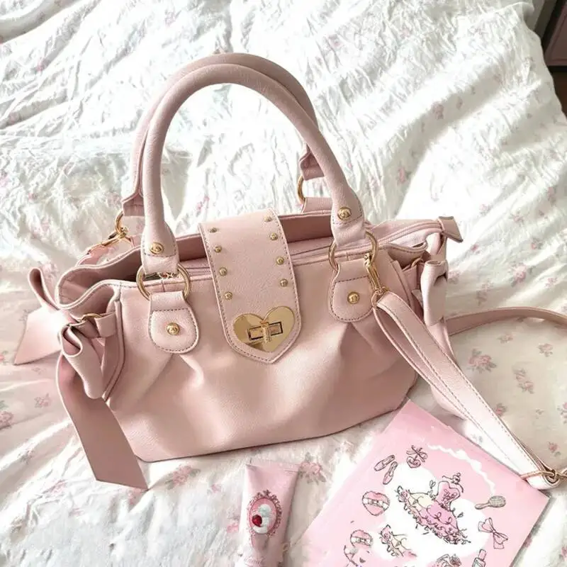 

Розовые сумки с бантом в стиле Лолиты для девочек, милые сумки на плечо с пряжкой в форме сердца, сумки через плечо из искусственной кожи JK, черные сумки Kawaii для женщин