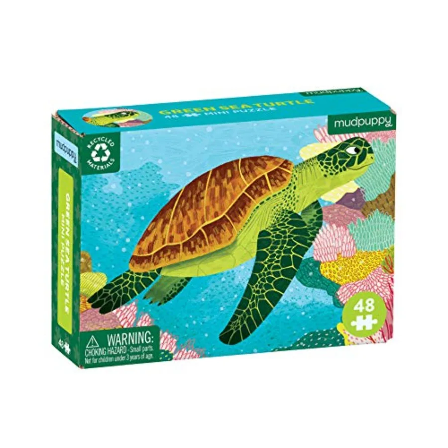 

Travel activity for children ages 4+: Mini puzzle featuring green sea turtle and vibrant underwater seascape on durable cardboa