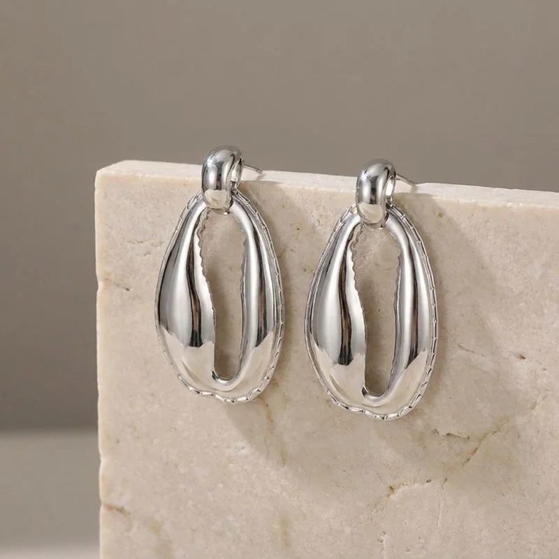 CarlidanaEuropean and American style heavy-duty shiny hollow water drop earrings Unique designer items that are trending