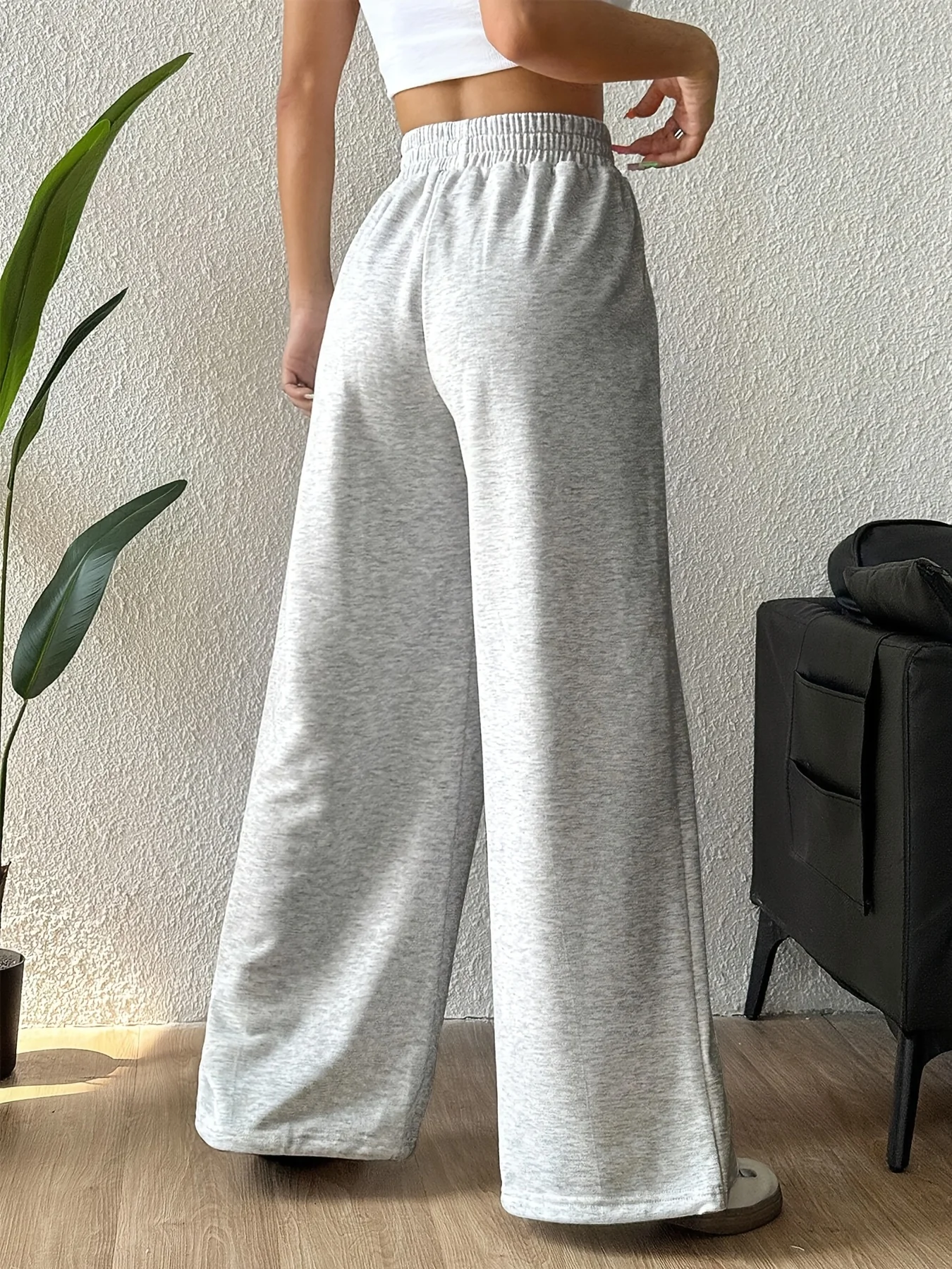 Women's Y2K-style straight-leg pants featuring a playful 