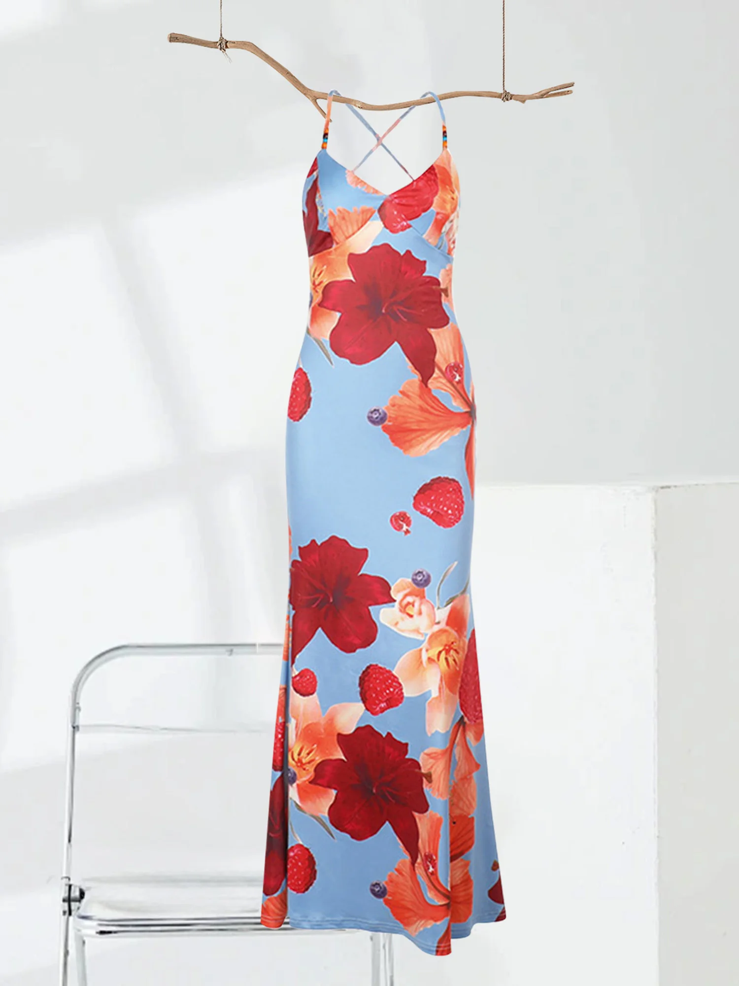 Abito da donna elegante senza maniche con stampa floreale con scollo a V e spalline sottili e dettagli incrociati sul retro per una vestibilità