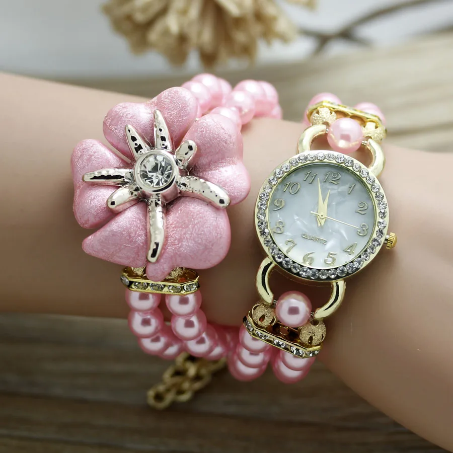Shsby New High Quality Ladies Pearl Strap Starfish Flower Bracelet Quartz Wristwatches Women Dress Watches Rhinestone Watches