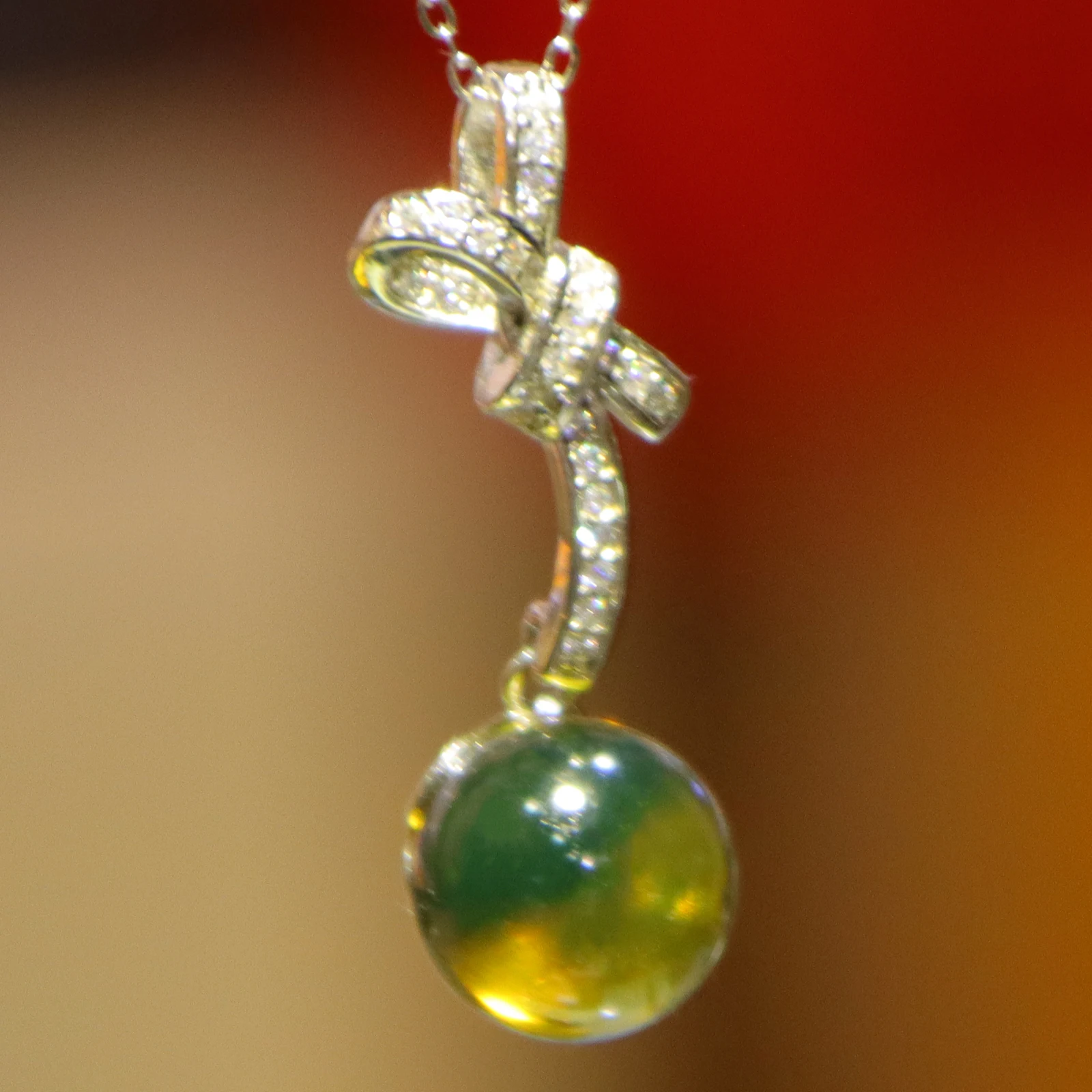 

Natural Mexican Blue Amber Sterling Silver Bow Tie Pendant with 10mm Round Bead Necklace