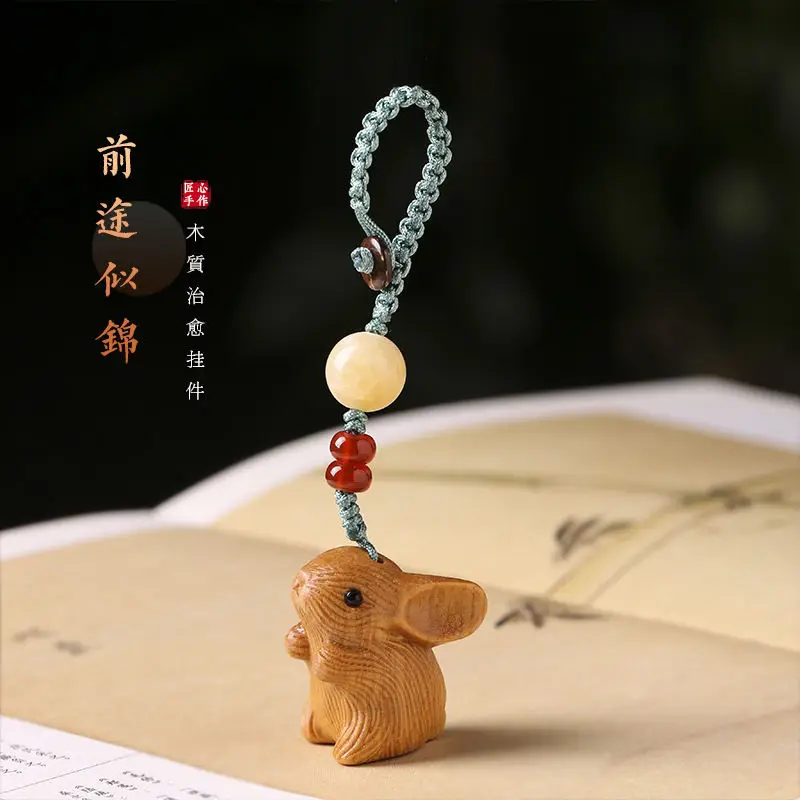 

Natural Sandalwood Simple Design Cute Zodiac Rabbit Wooden Cartoon Creative Key Chain Pendant Bag Mobile Phone Lanyard Couple