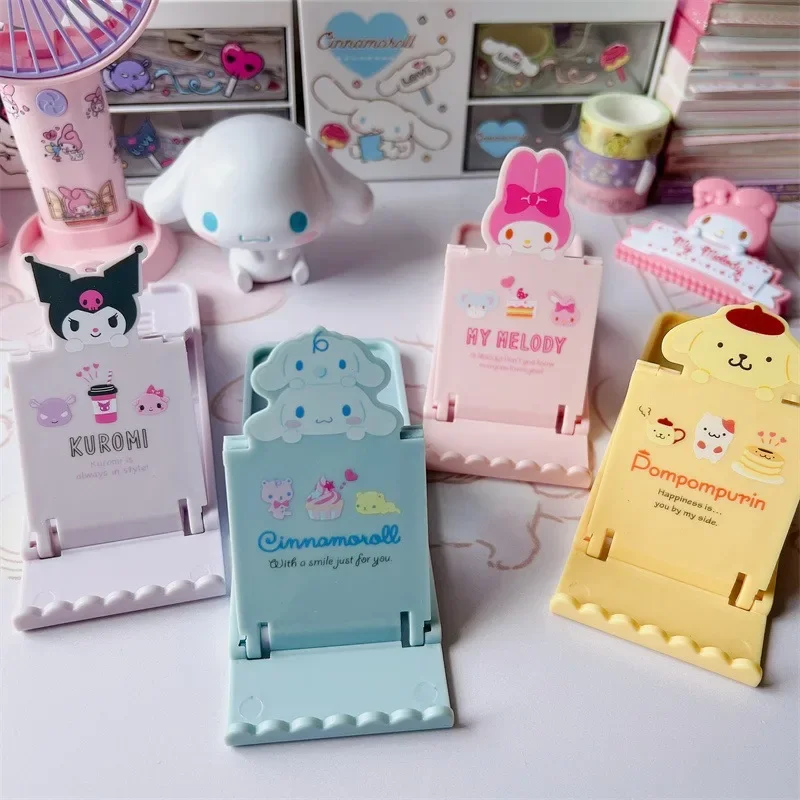 

Sanrio Hello Kitty IPhone Holder Cute Cartoon Kuromi Cinnamoroll Portable Go Out Adjustable Lazy People Bracket Holiday Gifts