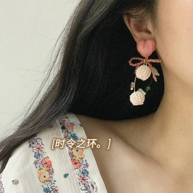 South Korea Dongdaemun gentle pink sweetheart ball stud earrings unique girlish feeling fresh dream bow earrings wholesale