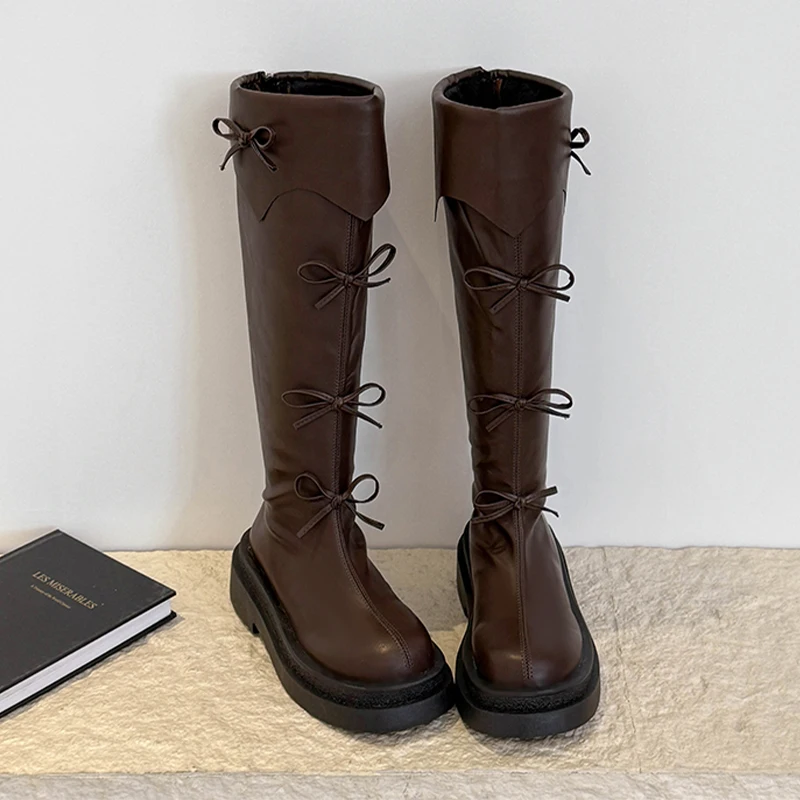 

Женские высокие сапоги до колена на плоской подошве с бантом, модная обувь, дизайнерские модельные зимние сапоги, 2025 г., повседневные новые трендовые уютные женские ботинки «Челси»