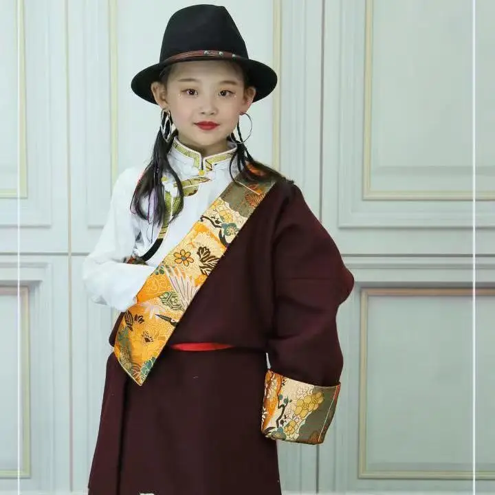 25 سنة الأطفال رداء التبت الجديد التطريز تقليد الملابس التبتية الفتيان والفتيات نفس النمط