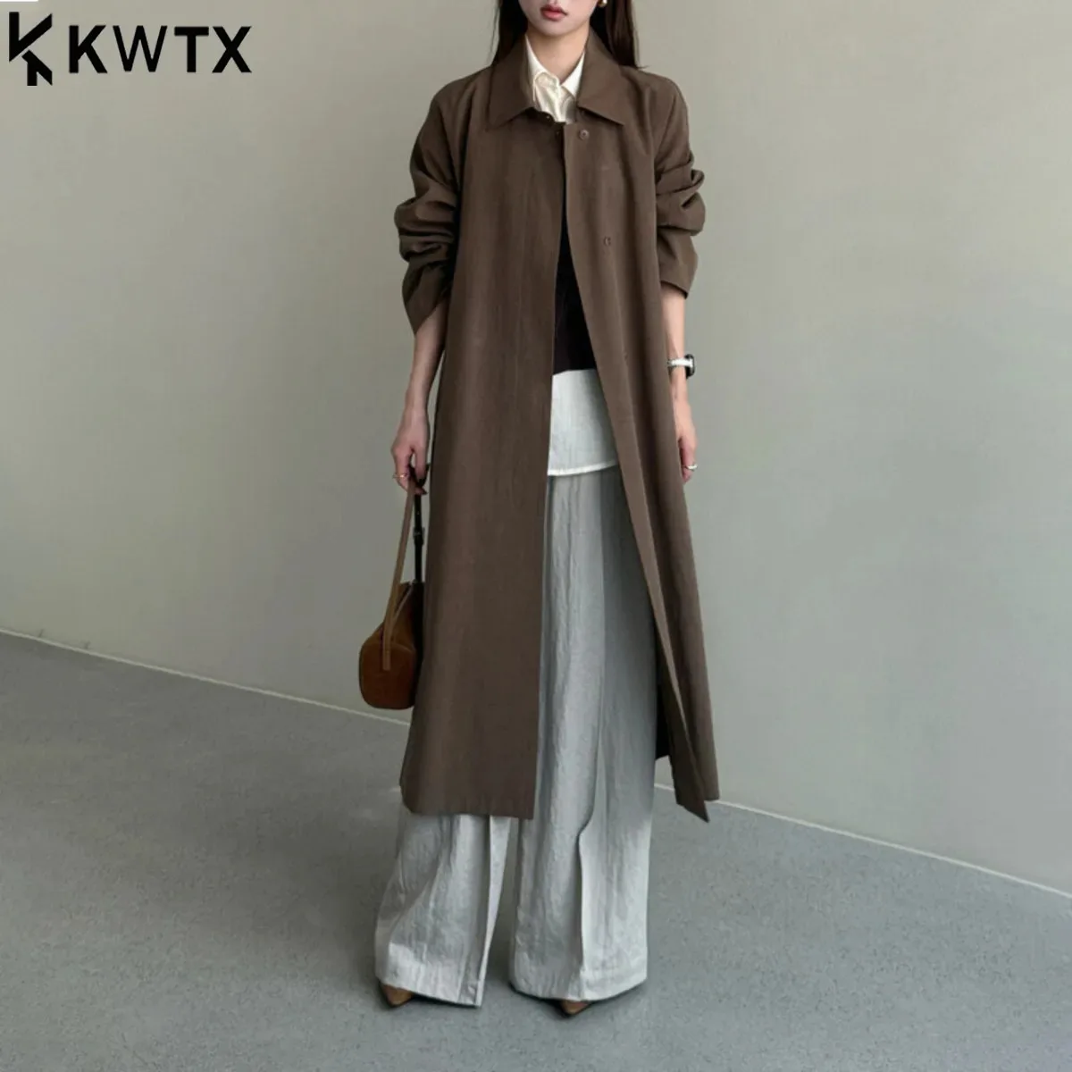 KWTX 2025 معطف نسائي طويل جديد مع طية صدر السترة جيوب بحزام واحدة الصدر ريترو شيك الحد الأدنى ملابس خارجية فاخرة للربيع/الخريف