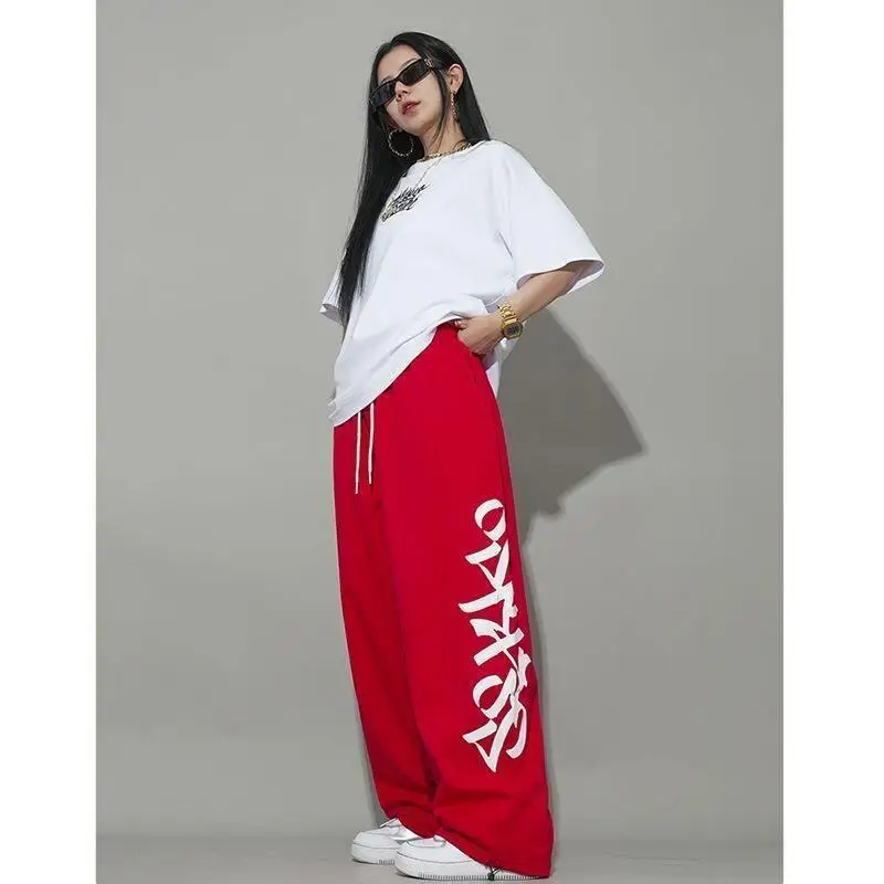 

Женские повседневные брюки, красные, хлопковые, для джазовых танцев, хип-хопа, спорта, новые, в американском уличном стиле, свободные, прямые, на шнурке