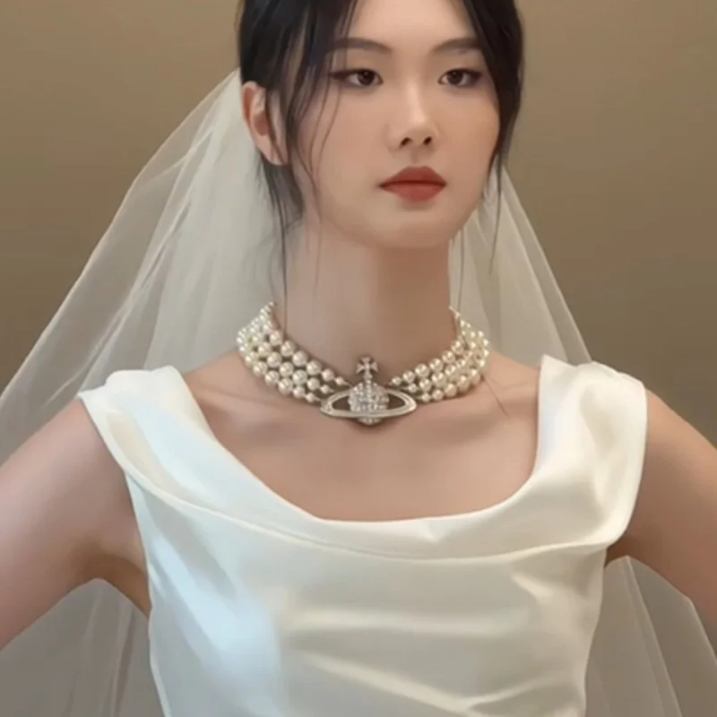 Fotografía de viaje vestido de novia ligero novia Simple de gama alta vestido de novia de satén francés vestido de nicho adelgazante recepción salida velo