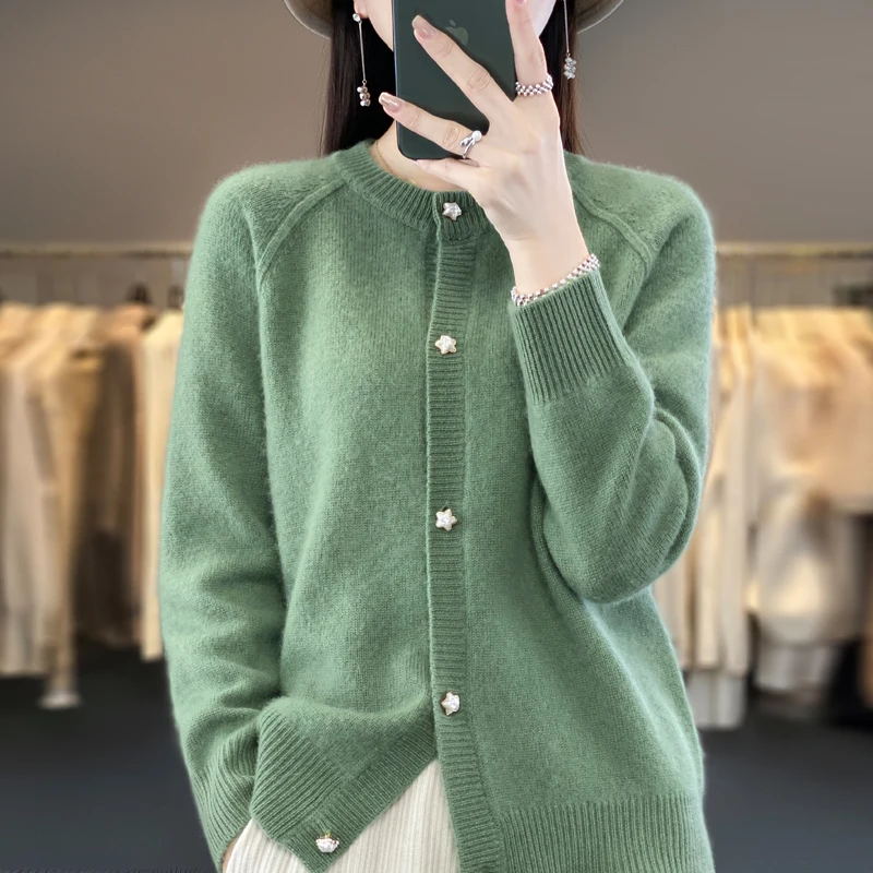 

Autumn and winter new 100% pure wool cardigan Joker solid color O-neck fashion padded warm star button women's loose top