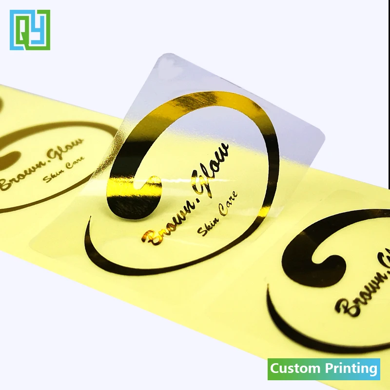 

1000pcs 42x28mm Manufactory Direct Custom Printing Logo Gold Foil Clear Labels Hot Stamping Metallic Effect Transparent Stickers