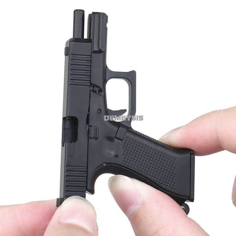 Brelok do kluczy G45 1:4 Mini brelok do kluczy w kształcie pistoletu Przenośny model Glock 45 Plastikowy brelok do kluczy Odłączane dekoracje broni