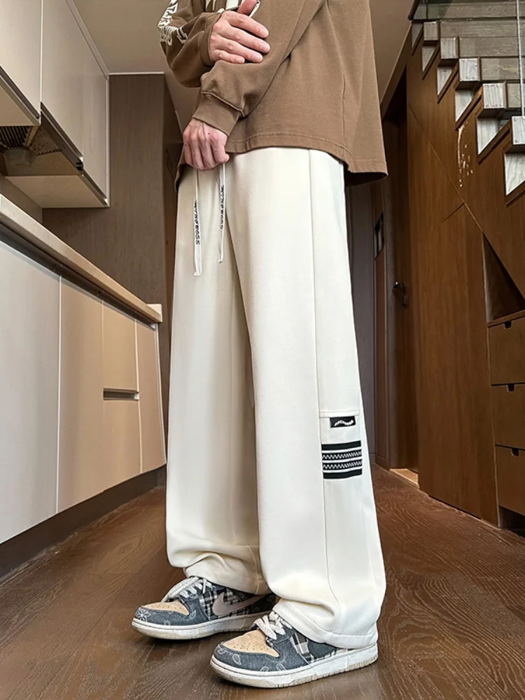 

Мужские повседневные брюки свободного кроя, широкие, струящиеся, в американском стиле, из плотного материала, модные, весенняя новинка, с этикеткой