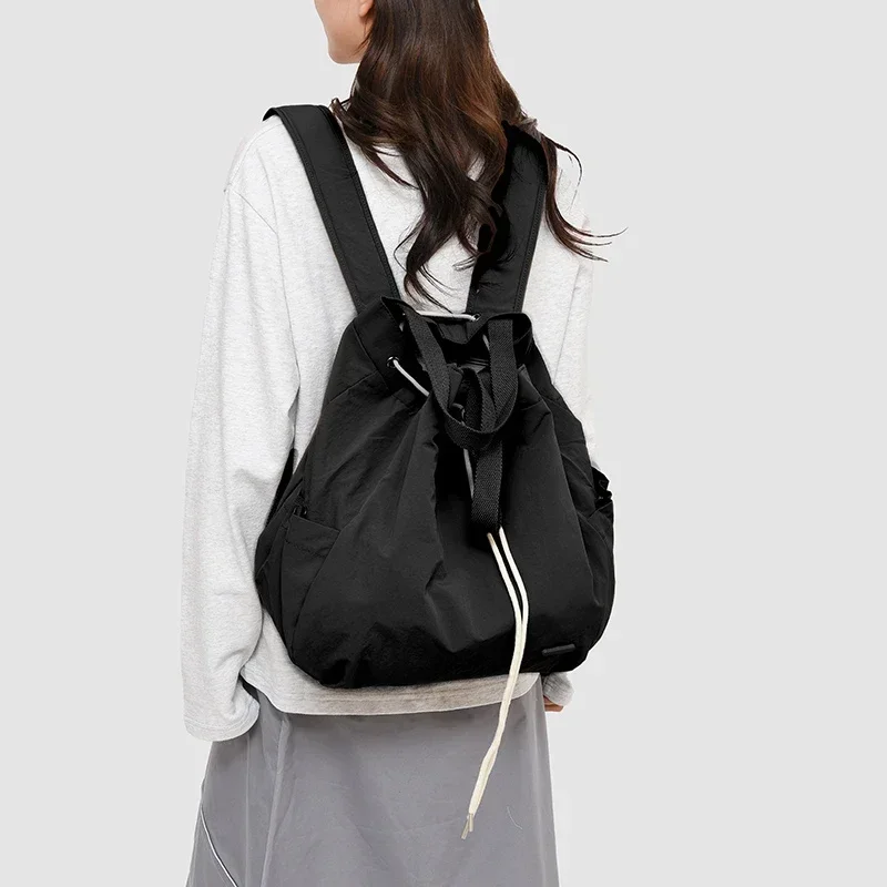 New Soft Solid Color Nylon Drawstring Backpacks 2026 High Quality Casual Backpacks for Women Versatile Sewing Thread School Bags