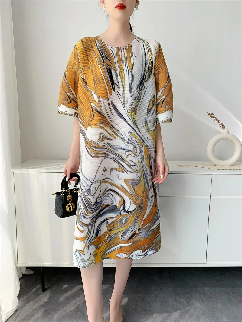 Printed midi pleated dress Pinterest pin warm weather travel